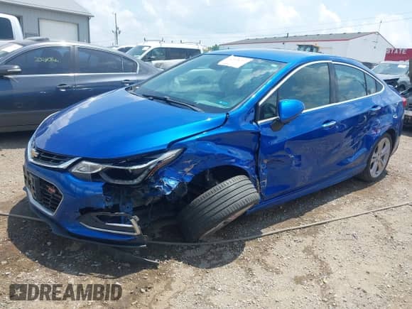 2016 Chevrolet Cruze Premier with VIN 1G1BG5SM1G7256546, listed as a IAAI auction lot 42576732 with 164,525 mi miles and . Bid and sale history available at DreamBid. Image 2.