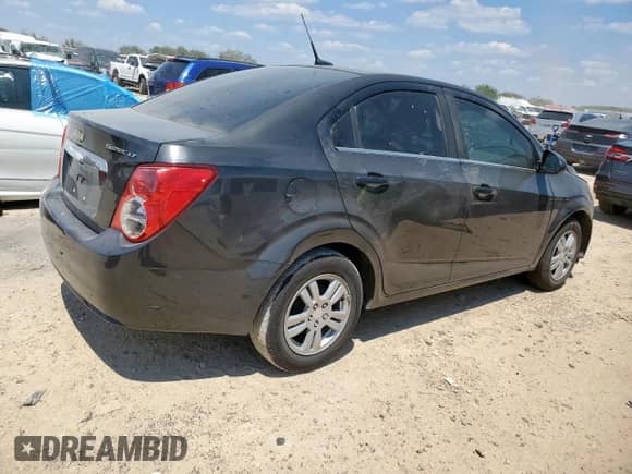 2014 Chevrolet Sonic LT с VIN 1G1JC5SHXE4243836, выставлен на аукционе Copart как лот 70467955 с пробегом 107 855 миль миль и Списание • Salvage title. История ставок и продаж доступна на DreamBid. Изображение 3.