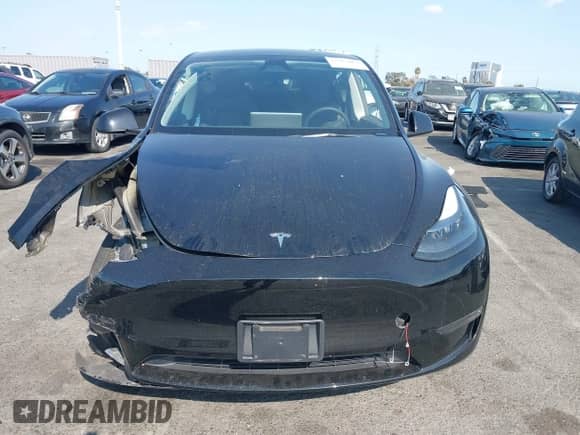 2023 Tesla Model Y Long Range z VIN 7SAYGAEE9PF851348, wystawiony jako IAAI lot #43167064 z przebiegiem Nie podano mil oraz . Historia ofert i sprzedaży dostępna na DreamBid. Obrazek 12.