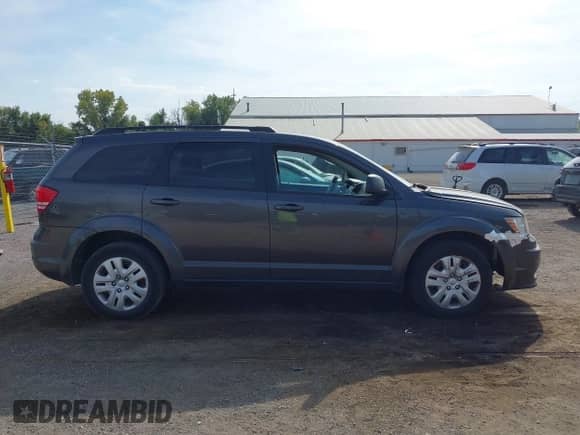 2017 Dodge Journey SE with VIN 3C4PDCABXHT560045, listed as a IAAI auction lot 43332641 with 159,859 mi miles and . Bid and sale history available at DreamBid. Image 12.