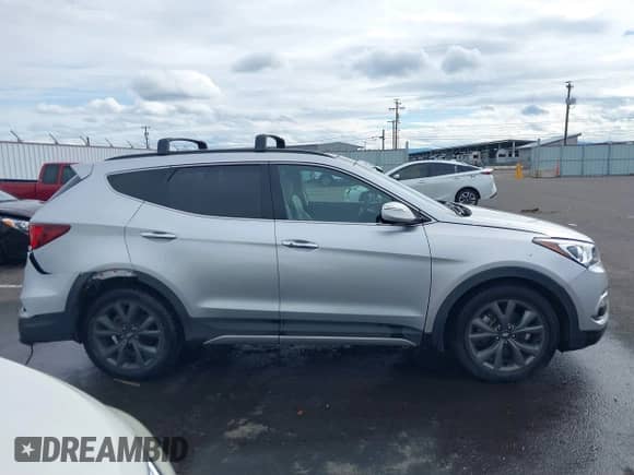 2018 Hyundai Santa Fe Ultimate with VIN 5XYZWDLA7JG542869, listed as a IAAI auction lot 41889520 with 51,294 mi miles and . Bid and sale history available at DreamBid. Image 13.