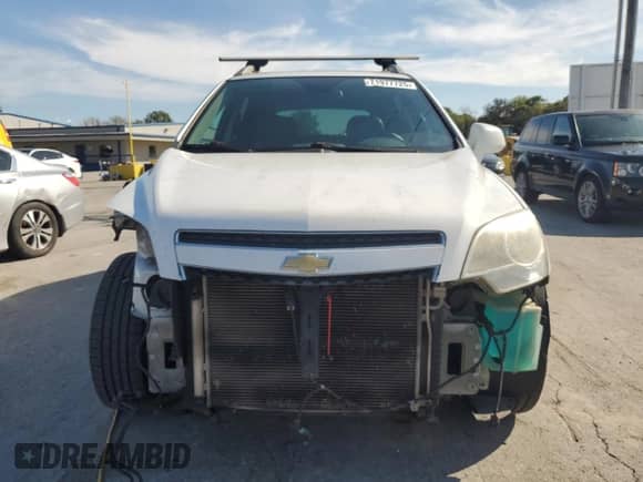 2014 Chevrolet Captiva Sport LT с VIN 3GNAL3EK9ES512306, выставлен на аукционе Copart как лот 71977725 с пробегом 142 652 миль миль и Списание • Salvage title. История ставок и продаж доступна на DreamBid. Изображение 5.