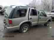 2003 Chevrolet Blazer LS с VIN 1GNCS13X63K129026, выставлен на аукционе Copart как лот 84567954 с пробегом Не указан миль и Списание • Salvage title. История ставок и продаж доступна на DreamBid. Изображение 3.
