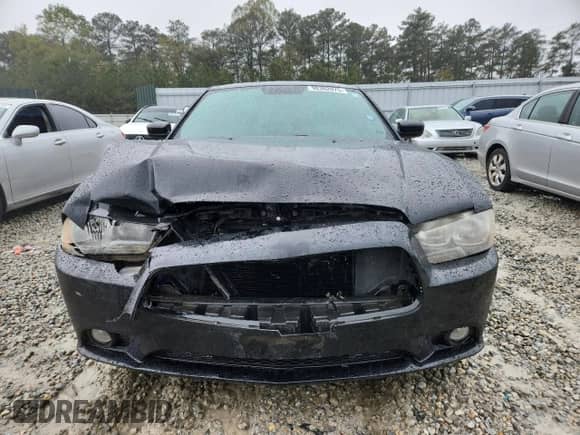 2012 Dodge Charger SXT z VIN 2C3CDXHG1CH272198, wystawiony jako Copart lot #90362075 z przebiegiem 186 070 mil mil oraz Czysty tytuł • Clean title. Historia ofert i sprzedaży dostępna na DreamBid. Obrazek 5.