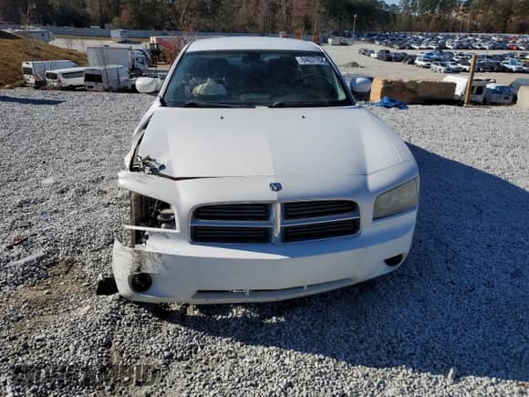 2010 Dodge Charger 3.5L with VIN 2B3CA2CV4AH317002, listed as a Copart auction lot 84037754 with 229,562 mi miles and Salvage title. Bid and sale history available at DreamBid. Image 5.