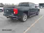 2018 Chevrolet Silverado 1500 High Country z VIN 3GCUKTEJ6JG178894, wystawiony jako IAAI lot #41606265 z przebiegiem 148 068 mil mil oraz . Historia ofert i sprzedaży dostępna na DreamBid. Obrazek 4.