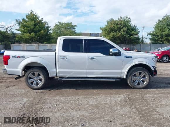 2018 Ford F-150 XL z VIN 1FTEW1EG2JKF48815, wystawiony jako IAAI lot #43303966 z przebiegiem 125 913 mil mil oraz . Historia ofert i sprzedaży dostępna na DreamBid. Obrazek 13.