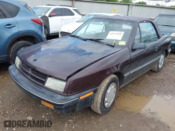 1991 Dodge Shadow with VIN 3B3XP45K5MT615827, listed as a IAAI auction lot 42157848 with 70,501 mi miles and . Bid and sale history available at DreamBid. Image 2.