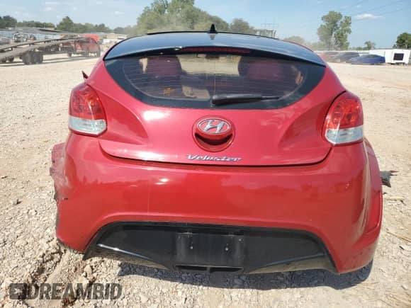 2012 Hyundai Veloster w/Gray Int z VIN KMHTC6AD4CU068724, wystawiony jako Copart lot #84521035 z przebiegiem 85 126 mil mil oraz Szkoda całkowita • Salvage title. Historia ofert i sprzedaży dostępna na DreamBid. Obrazek 6.