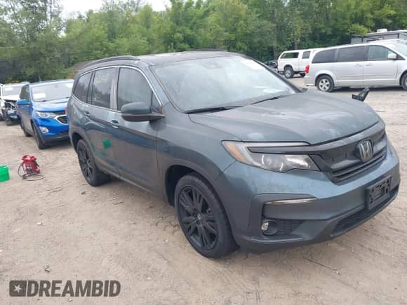 2022 Honda Pilot Special Edition with VIN 5FNYF6H25NB044627, listed as a IAAI auction lot 43060548 with 55,315 mi miles and . Bid and sale history available at DreamBid. Image 1.