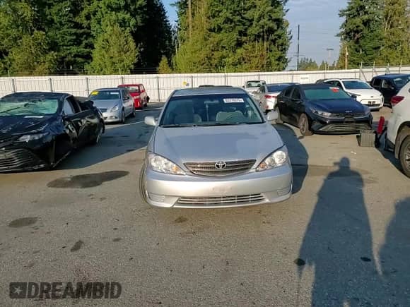 2005 Toyota Camry LE с VIN 4T1BE32K95U085958, выставлен на аукционе Copart как лот 82278075 с пробегом 155 026 миль миль и Списание • Salvage title. История ставок и продаж доступна на DreamBid. Изображение 13.