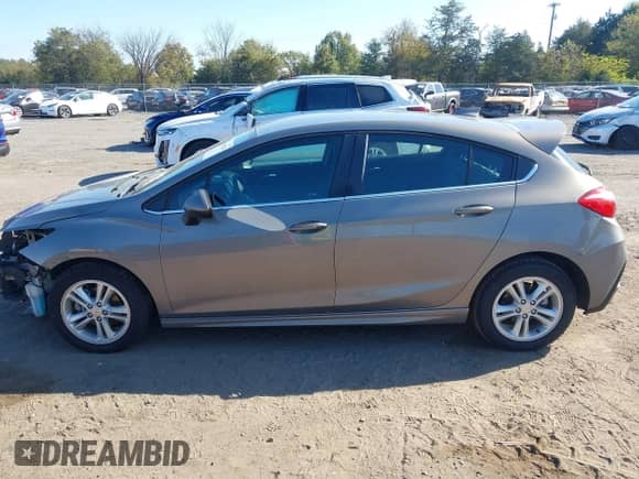 2018 Chevrolet Cruze LT с VIN 3G1BE6SM5JS650605, выставлен на аукционе IAAI как лот 43382642 с пробегом 96 296 миль миль и . История ставок и продаж доступна на DreamBid. Изображение 14.
