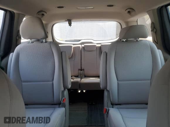 2017 Kia Sedona L with VIN KNDMA5C15H6259687, listed as a Copart auction lot 61763205 with 118,512 mi miles and Salvage title. Bid and sale history available at DreamBid. Image 10.