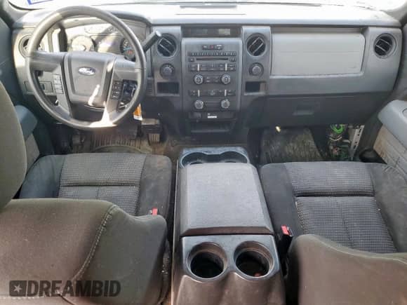 2014 Ford F-150 XLT с VIN 1FTFW1EF0EKG44329, выставлен на аукционе Copart как лот 85263155 с пробегом 199 142 миль миль и Списание • Salvage title. История ставок и продаж доступна на DreamBid. Изображение 8.