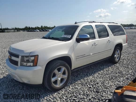 2012 Chevrolet Suburban LTZ z VIN 1GNSCKE04CR163228, wystawiony jako Copart lot #57272075 z przebiegiem Nie podano mil oraz Szkoda całkowita • Salvage title. Historia ofert i sprzedaży dostępna na DreamBid. Obrazek 1.