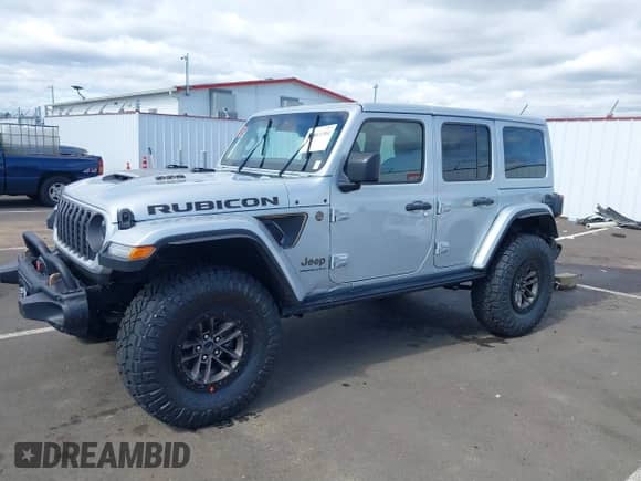 2024 Jeep Wrangler Rubicon 392 with VIN 1C4RJXSJ7RW313107, listed as a IAAI auction lot 41861304 with 635 mi miles and . Bid and sale history available at DreamBid. Image 2.