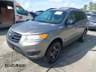 2012 Hyundai Santa Fe GLS z VIN 5XYZGDAB2CG130256, wystawiony jako IAAI lot #43400835 z przebiegiem 284 569 mil mil oraz . Historia ofert i sprzedaży dostępna na DreamBid. Obrazek 2.