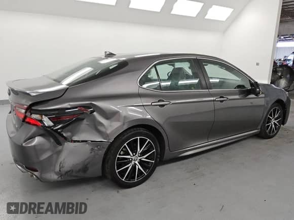 2023 Toyota Camry SE with VIN 4T1G11AK3PU750783, listed as a Copart auction lot 80610725 with 61,857 mi miles and Salvage title. Bid and sale history available at DreamBid. Image 3.