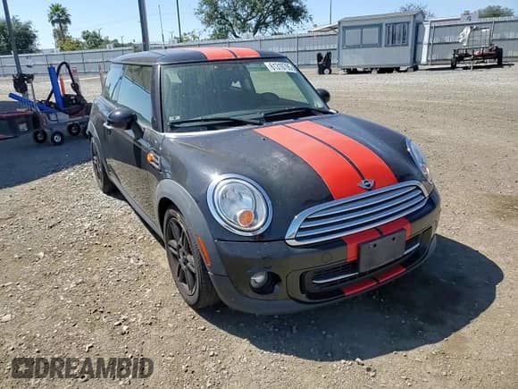 2013 MINI Hardtop with VIN WMWSU3C51DT681423, listed as a Copart auction lot 61310795 with 97,510 mi miles and Salvage title. Bid and sale history available at DreamBid. Image 13.