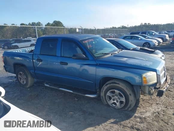 2005 Dodge Dakota SLT с VIN 1D7HE48K35S132981, выставлен на аукционе IAAI как лот 41475748 с пробегом 205 677 миль миль и . История ставок и продаж доступна на DreamBid. Изображение 13.
