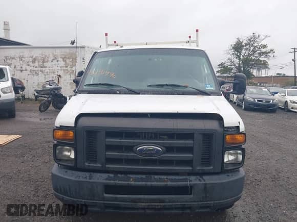 2013 Ford Econoline Cargo Commercial with VIN 1FTNE2EW7DDA65037, listed as a IAAI auction lot 43291990 with 233,281 mi miles and . Bid and sale history available at DreamBid. Image 12.