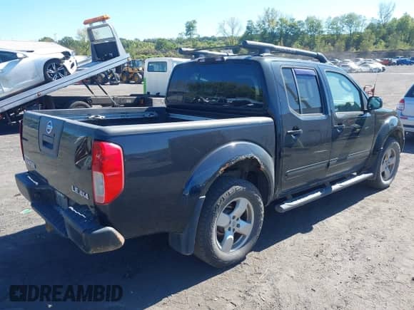 2007 Nissan Frontier LE with VIN 1N6AD07W37C444367, listed as a IAAI auction lot 43344529 with 221,942 mi miles and . Bid and sale history available at DreamBid. Image 4.