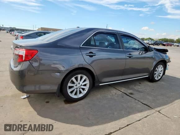 2014 Toyota Camry SE with VIN 4T1BK1FK2EU541452, listed as a Copart auction lot 83859135 with 135,589 mi miles and Salvage title. Bid and sale history available at DreamBid. Image 3.