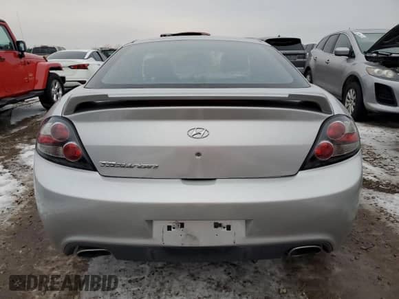 2008 Hyundai Tiburon GS с VIN KMHHM66D48U292160, выставлен на аукционе Copart как лот 84760964 с пробегом 114 878 миль миль и Списание • Salvage title. История ставок и продаж доступна на DreamBid. Изображение 6.