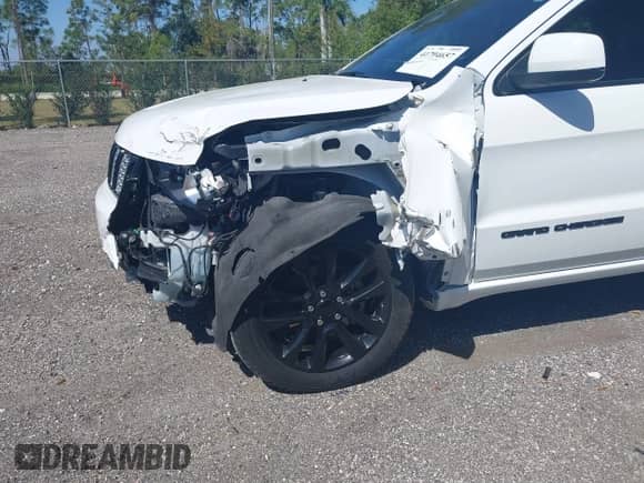 2017 Jeep Grand Cherokee Laredo with VIN 1C4RJEAG1HC845737, listed as a IAAI auction lot 41794657 with 88,015 mi miles and . Bid and sale history available at DreamBid. Image 6.