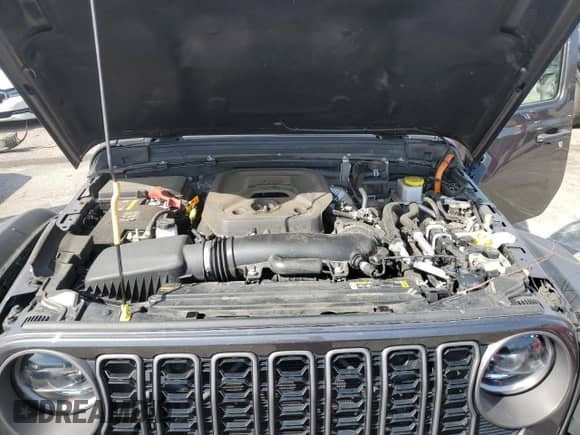 2024 Jeep Wrangler Rubicon z VIN 1C4RJXR66RW291716, wystawiony jako Copart lot #84422185 z przebiegiem 38 014 mil mil oraz Szkoda całkowita • Salvage title. Historia ofert i sprzedaży dostępna na DreamBid. Obrazek 11.