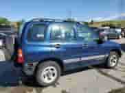 2002 Chevrolet Tracker with VIN 2CNBE13C926933455, listed as a Copart auction lot 58235764 with 189,629 mi miles and Salvage title. Bid and sale history available at DreamBid. Image 3.