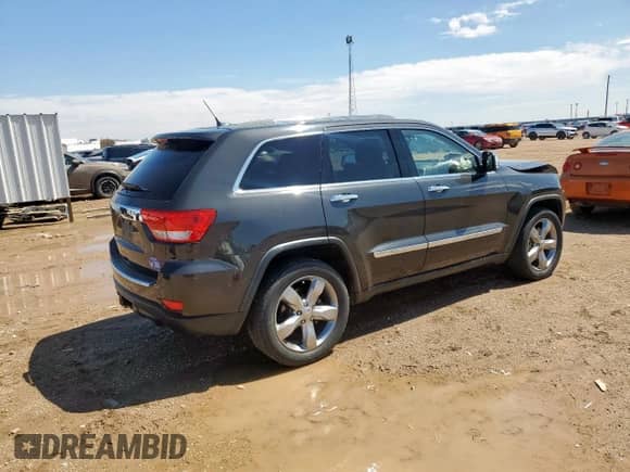 2011 Jeep Grand Cherokee Overland with VIN 1J4RR6GT7BC722383, listed as a Copart auction lot 80467695 with 135,083 mi miles and Salvage title. Bid and sale history available at DreamBid. Image 3.