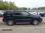 2013 Honda Pilot Touring with VIN 5FNYF4H97DB047819, listed as a IAAI auction lot 43299908 with 253,413 mi miles and . Bid and sale history available at DreamBid. Image 13.