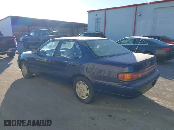 1994 Toyota Camry LE z VIN 4T1SK12EXRU374215, wystawiony jako IAAI lot #41581093 z przebiegiem 80 397 mil mil oraz . Historia ofert i sprzedaży dostępna na DreamBid. Obrazek 3.