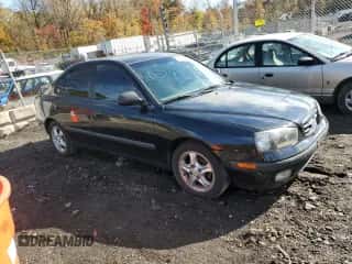2003 Hyundai Elantra GLS with VIN KMHDN45D33U701274, listed as a Copart auction lot 90830075 with 62,862 mi miles and Salvage title. Bid and sale history available at DreamBid. Image 4.