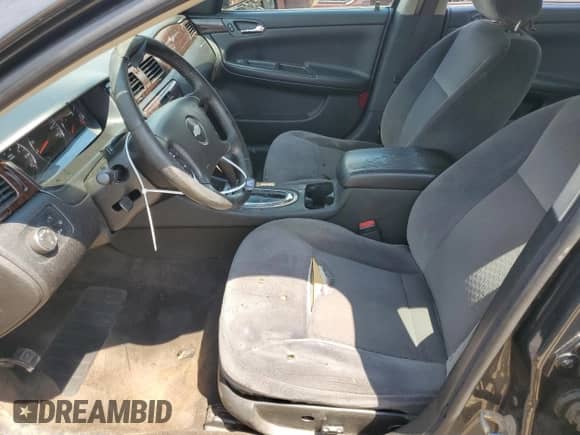 2013 Chevrolet Impala LT z VIN 2G1WG5E36D1233633, wystawiony jako Copart lot #69065735 z przebiegiem 183 633 mil mil oraz Szkoda całkowita • Salvage title. Historia ofert i sprzedaży dostępna na DreamBid. Obrazek 7.