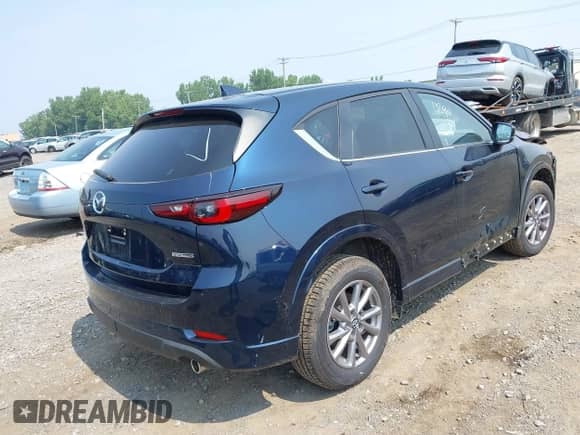 2024 Mazda CX-5 S Select z VIN JM3KFBBL2R0475020, wystawiony jako IAAI lot #42901480 z przebiegiem 1 851 mil mil oraz . Historia ofert i sprzedaży dostępna na DreamBid. Obrazek 4.