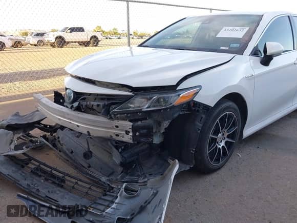 2021 Toyota Camry Hybrid LE with VIN 4T1C31AK3MU560440, listed as a IAAI auction lot 43202632 with 65,038 mi miles and . Bid and sale history available at DreamBid. Image 6.