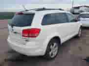 2009 Dodge Journey SXT with VIN 3D4GH57V49T554862, listed as a IAAI auction lot 43257196 with 166,124 mi miles and . Bid and sale history available at DreamBid. Image 4.