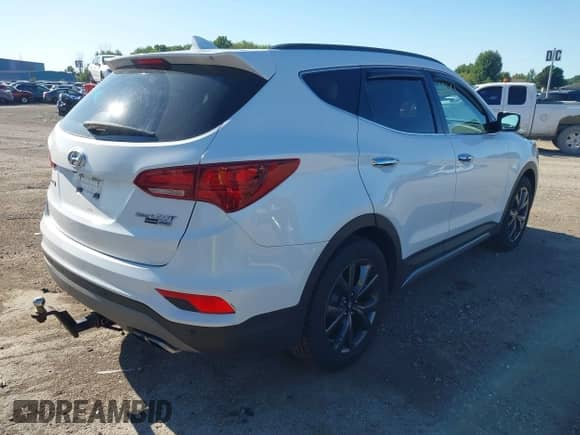 2018 Hyundai Santa Fe Ultimate with VIN 5NMZWDLA2JH105416, listed as a IAAI auction lot 43062661 with 67,574 mi miles and . Bid and sale history available at DreamBid. Image 4.