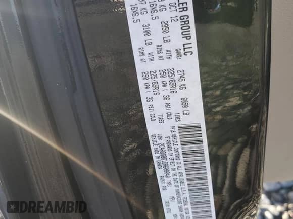 2013 Dodge Grand Caravan SE with VIN 2C4RDGBG1DR608040, listed as a Copart auction lot 85318475 with 107,927 mi miles and Salvage title. Bid and sale history available at DreamBid. Image 13.