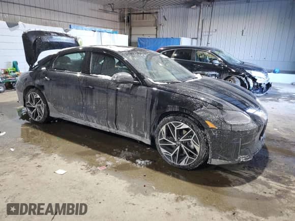 2024 Hyundai Ioniq 6 Limited с VIN KMHM54AC1RA074257, выставлен на аукционе Copart как лот 42086145 с пробегом 5 793 миль миль и Списание • Salvage title. История ставок и продаж доступна на DreamBid. Изображение 4.