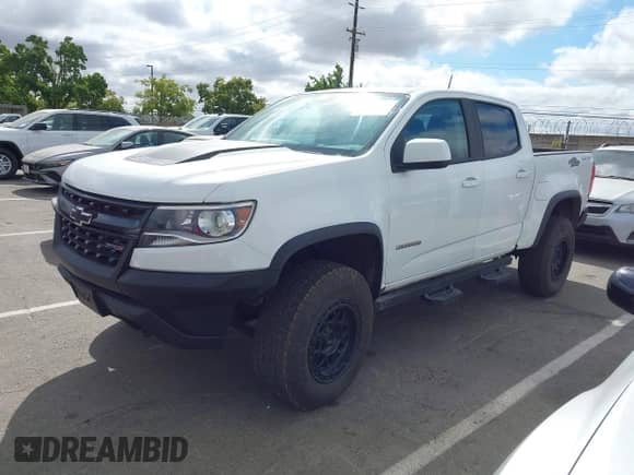 2018 Chevrolet Colorado 4WD ZR2 with VIN 1GCGTEEN8J1305152, listed as a IAAI auction lot 43199483 with 37,198 mi miles and . Bid and sale history available at DreamBid. Image 2.