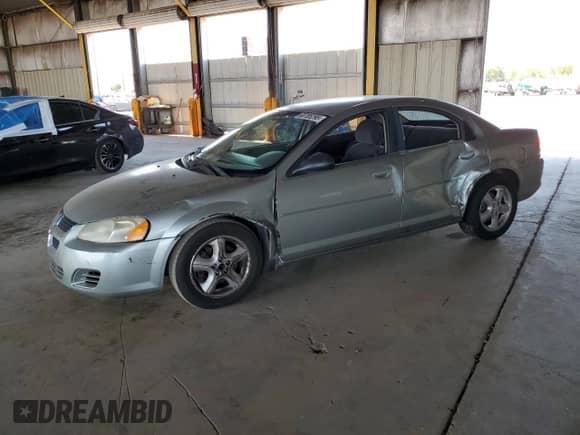 2005 Dodge Stratus SXT with VIN 1B3EL46X85N509659, listed as a Copart auction lot 68785295 with 140,643 mi miles and Salvage title. Bid and sale history available at DreamBid. Image 1.