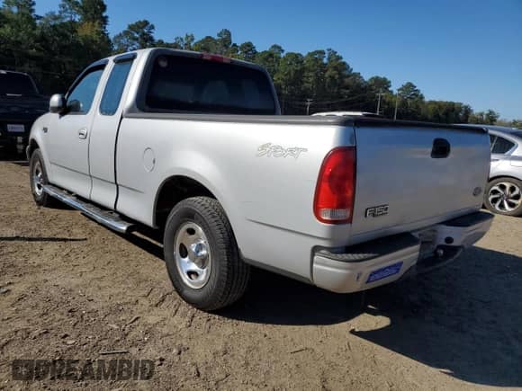 2001 Ford F-150 XL с VIN 1FTZX17231NA36253, выставлен на аукционе Copart как лот 85595575 с пробегом 203 731 миль миль и Списание • Salvage title. История ставок и продаж доступна на DreamBid. Изображение 2.