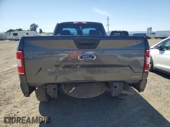 2018 Ford F-150 XL z VIN 1FTMF1CP1JKC72478, wystawiony jako Copart lot #56513615 z przebiegiem 186 659 mil mil oraz Szkoda całkowita • Salvage title. Historia ofert i sprzedaży dostępna na DreamBid. Obrazek 6.