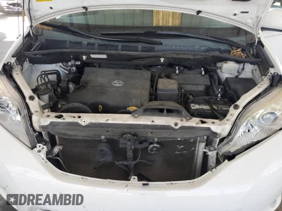 2014 Toyota Sienna XLE with VIN 5TDYK3DC2ES411861, listed as a Copart auction lot 81555925 with 184,497 mi miles and Salvage title. Bid and sale history available at DreamBid. Image 12.
