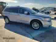 2017 Dodge Journey SXT with VIN 3C4PDCBG9HT572469, listed as a Copart auction lot 81464005 with 77,095 mi miles and Salvage title. Bid and sale history available at DreamBid. Image 4.