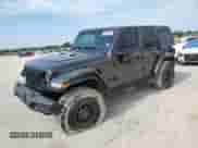 2023 Jeep Wrangler Willys with VIN 1C4HJXDGXPW526093, listed as a Copart auction lot 56818935 with 24,021 mi miles and Salvage title. Bid and sale history available at DreamBid. Image 1.