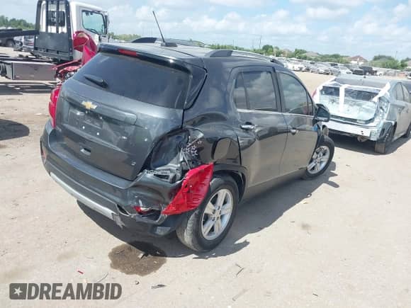 2018 Chevrolet Trax LT with VIN KL7CJLSB5JB628116, listed as a IAAI auction lot 42800982 with 133,857 mi miles and . Bid and sale history available at DreamBid. Image 4.